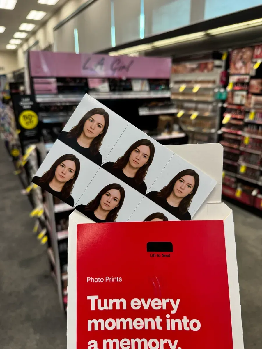 The 4x6 passport photo sheet printed as a regular CVS photo print, picked up from the store
